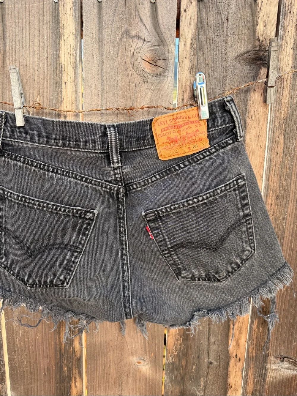 Levi's Black Frayed Denim Cutoff Shorts size 28